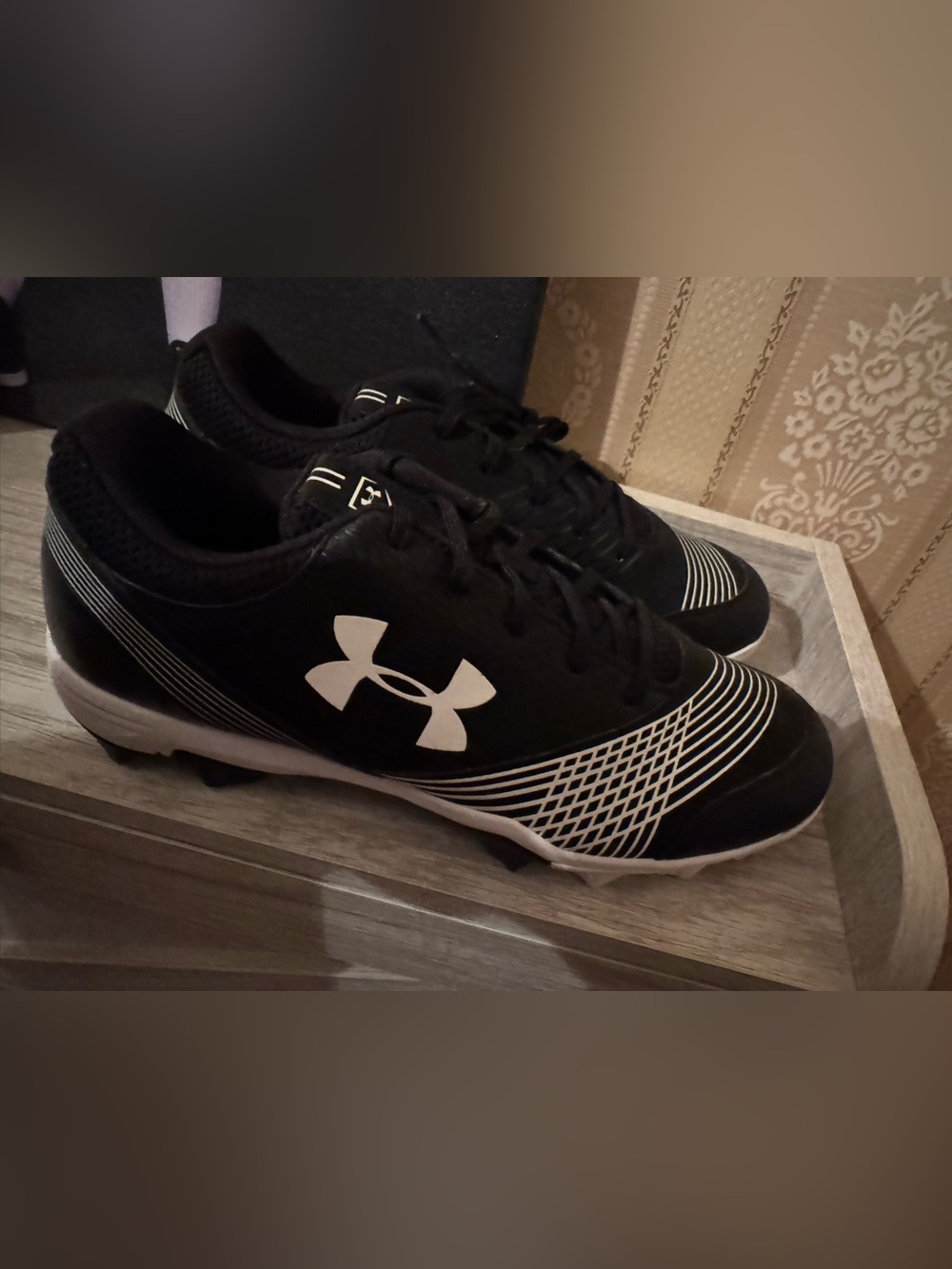 Under Armour Women’s Black and White Athletic Cleats
